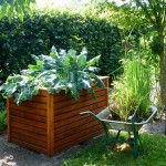 wooden-raised-vegetable-bed-stained-and-sealed